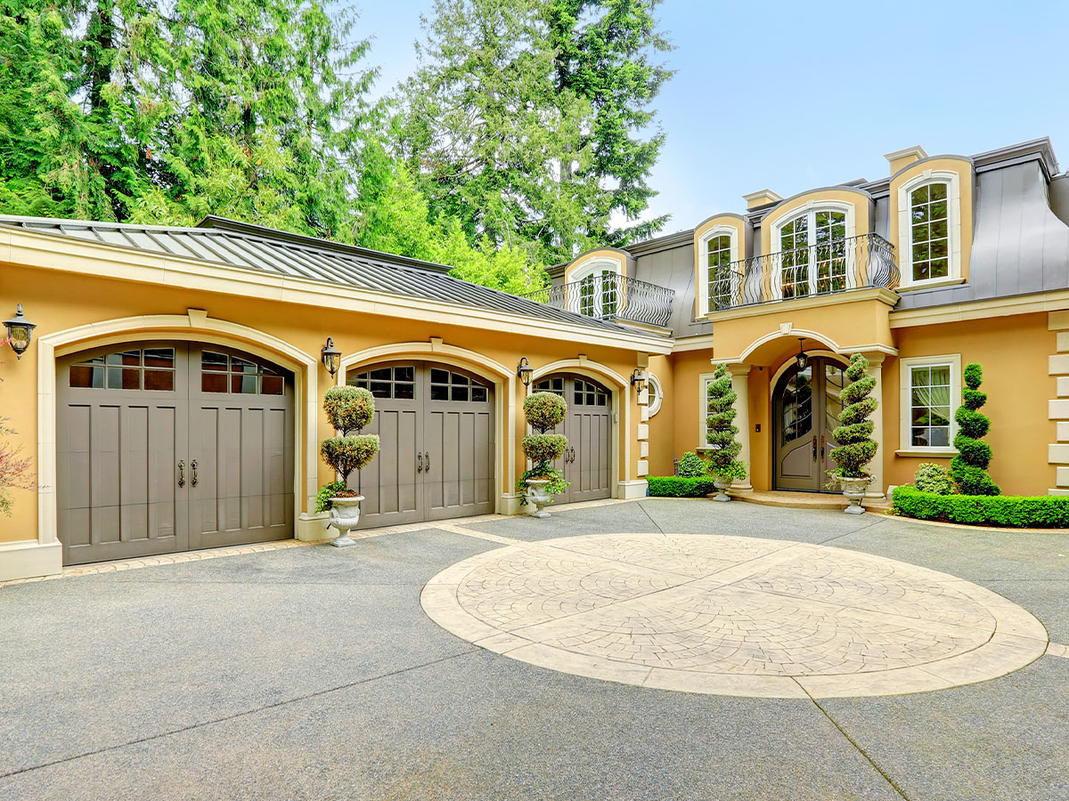 luxury house with three-car garage